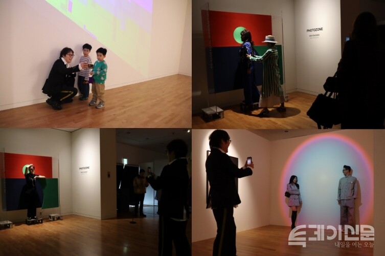 포토존에서 사진을 찍어주는 등 관객과 소통하는 서대호 작가 ⓒ투데이신문